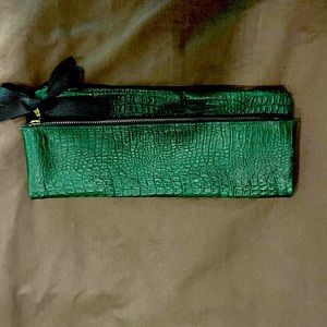 Handmade leather clutch.